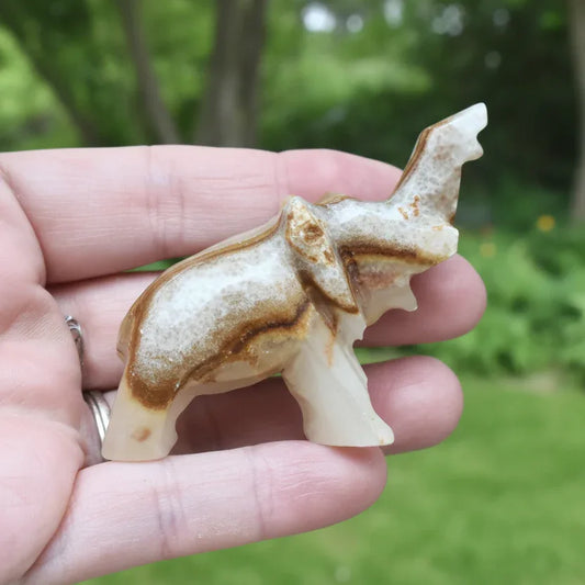 Eléphant en Calcite et Aragonite 42g (PRGFL346-63)