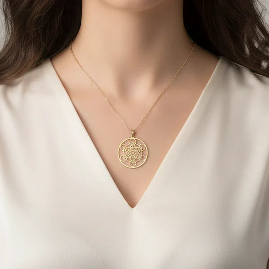 Pendentif Cube de Metatron en acier inoxydable doré