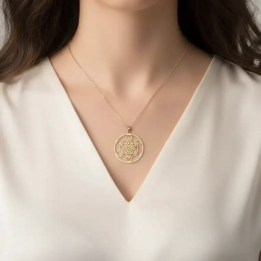 Pendentif Cube de Metatron en acier inoxydable doré