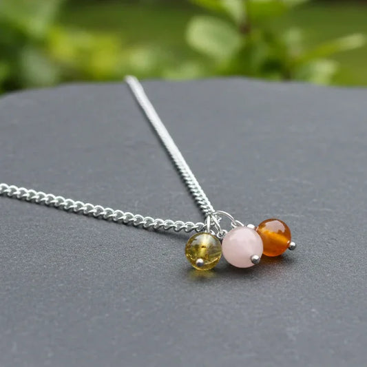 Collier 3 perles : Ambre, Pierre de Lune pêche et Cornaline - ENAE Minéraux