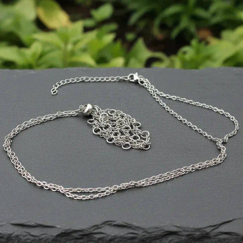 Pendentif panier pour les pierres